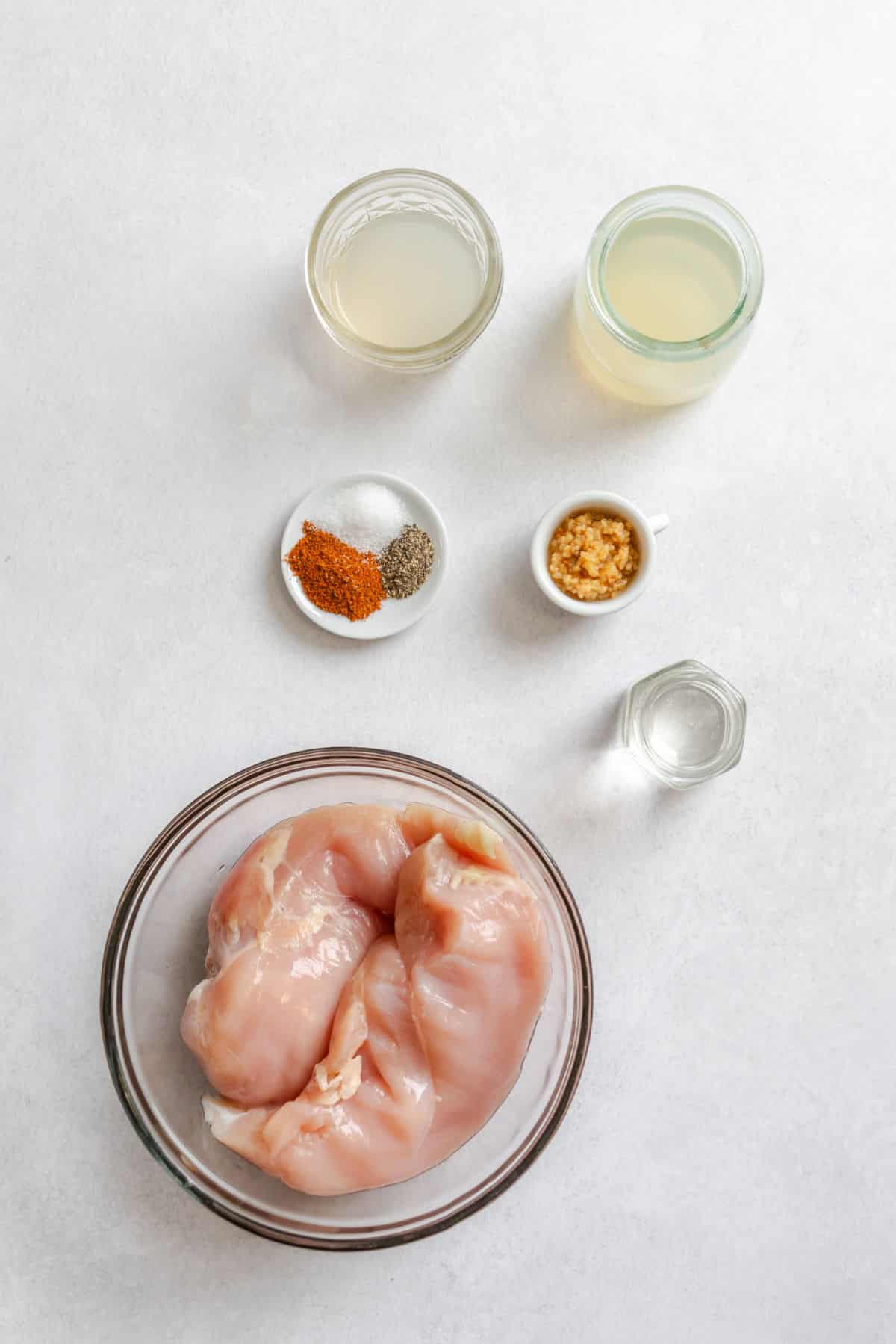 Ingredients for tequila lime chicken marinade in dishes.