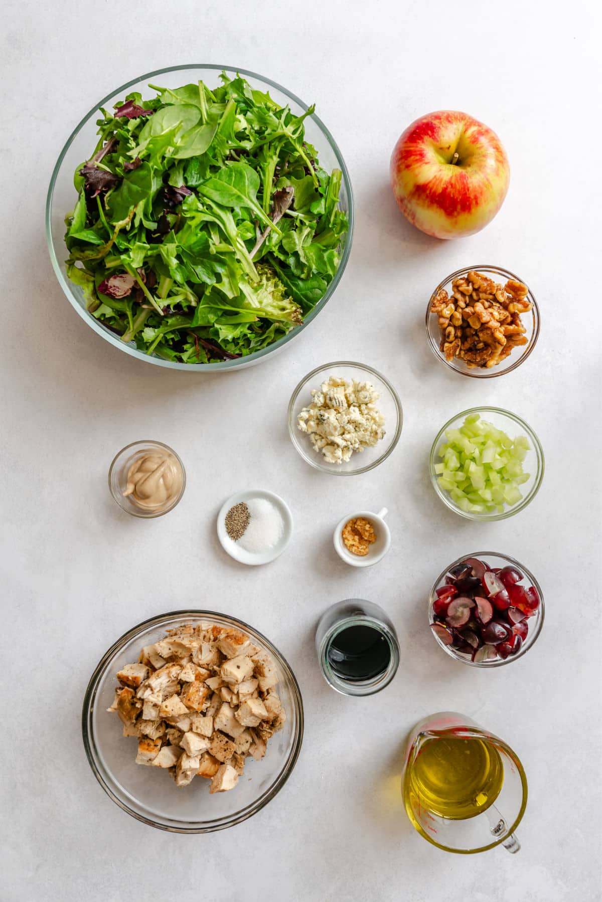 Ingredients for cpk copycat waldorf salad in dishes.