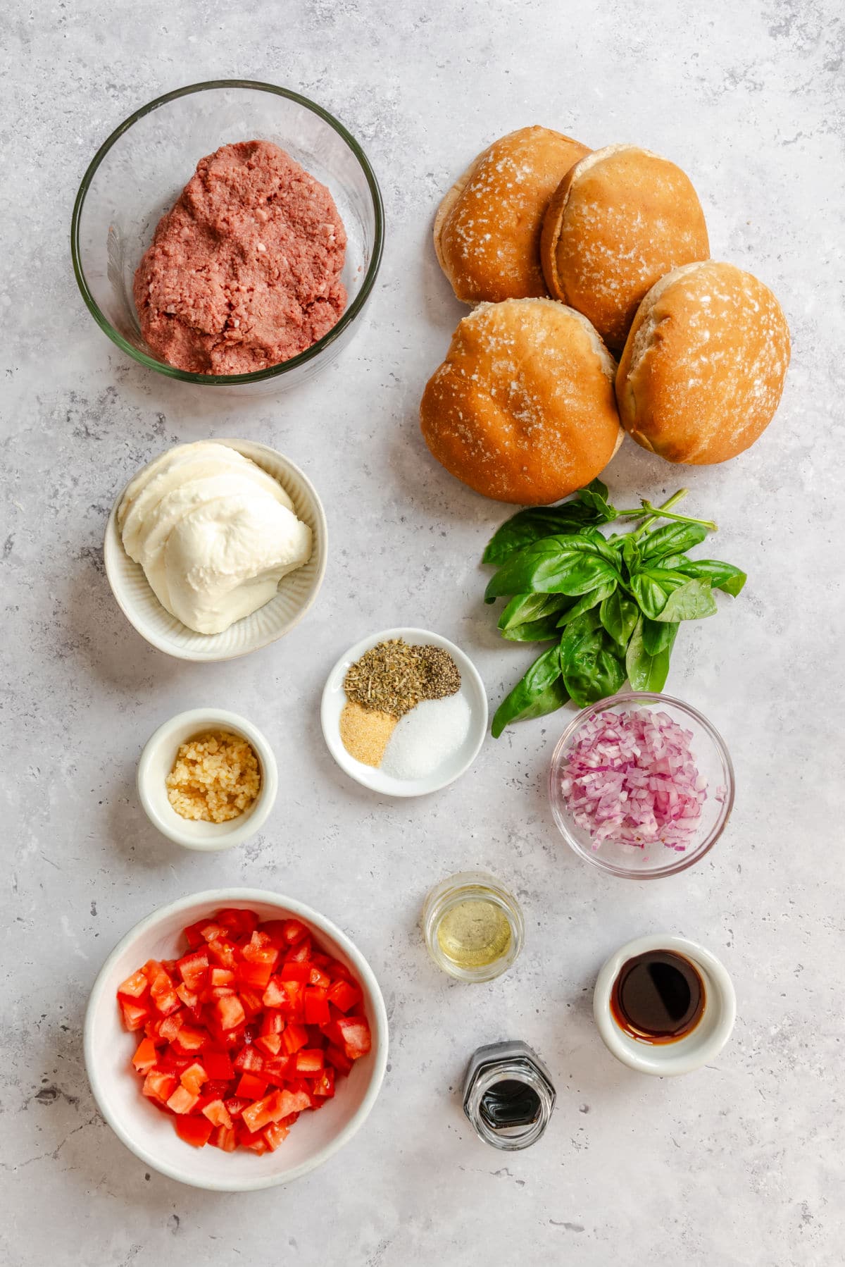 Ingredients for bruschetta burgers in dishes.