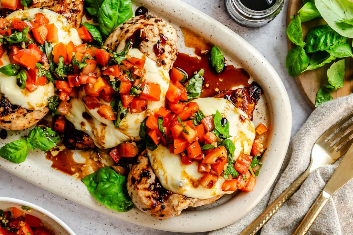 Overhead photo of bruschetta chicken on a platter. 