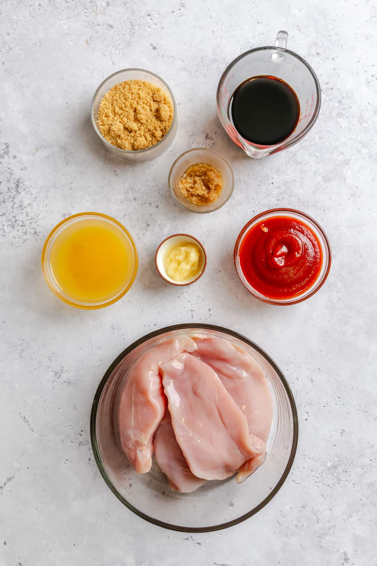 Ingredients for huli huli chicken in dishes.
