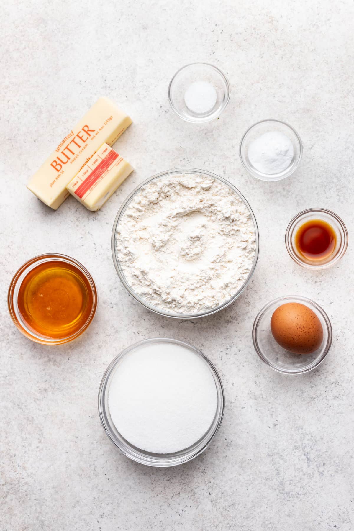 Ingredients for honey cookies in dishes.