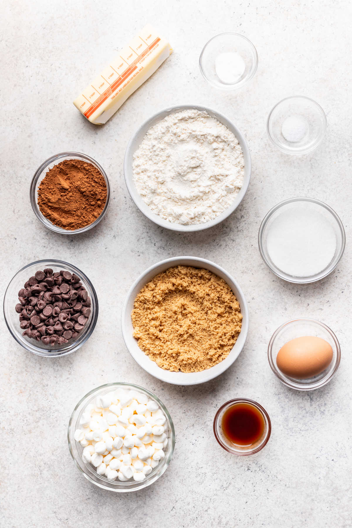 Ingredients for chocolate marshmallow cookies in dishes.