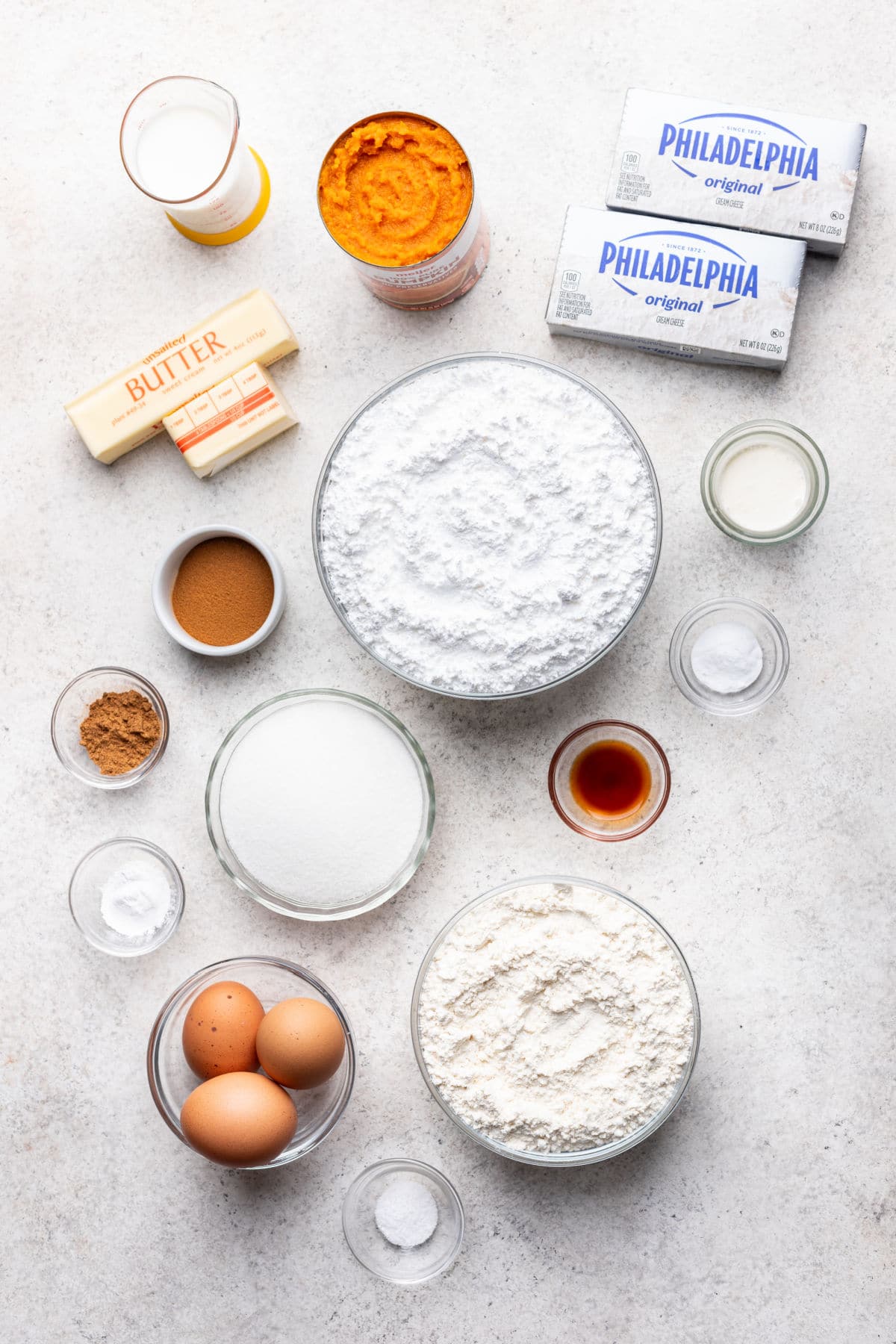 Ingredients for pumpkin layer cake in dishes.